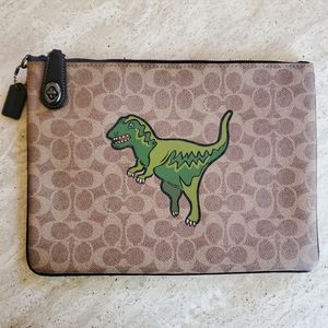 Turnlock Pouch In Signature Canvas With Rexy